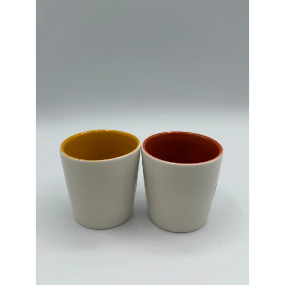 Starbucks Espresso Shot Glass Set of 2 Ceramic White Orange Yellow Siren Logo